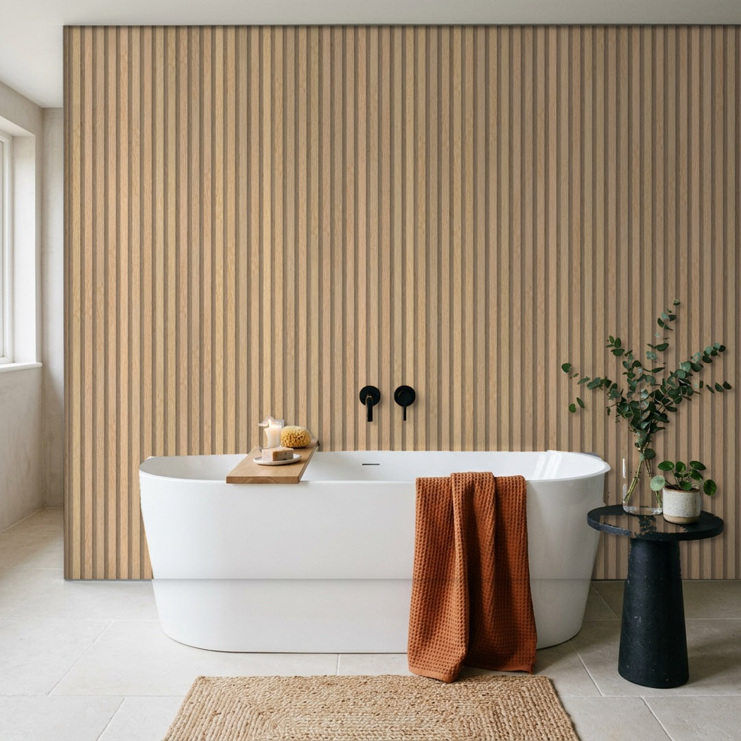 Oak Dry-Slat waterproof slat wall panels as a bathroom feature wall behind a freestanding bath