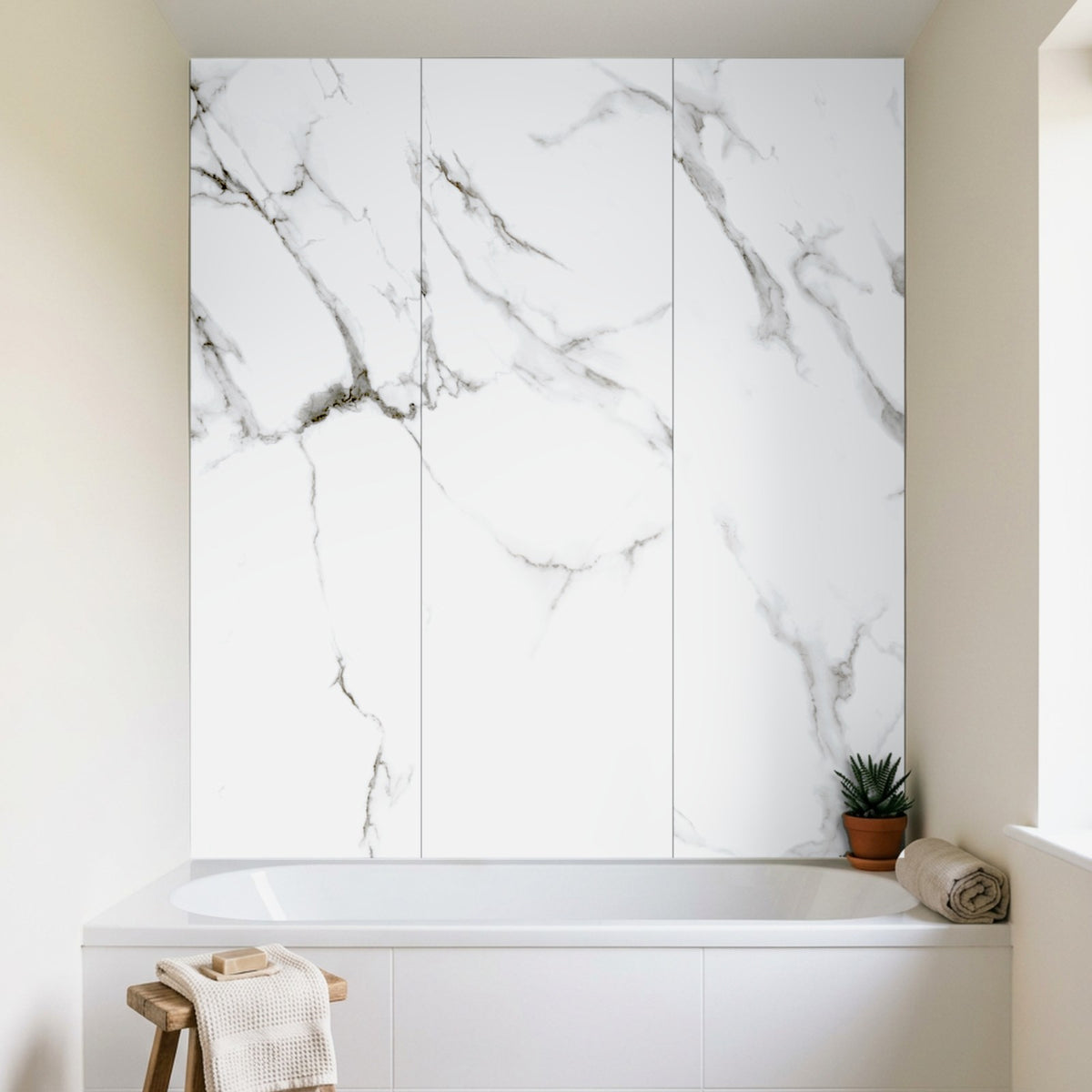 Carrera marble Rapid Stone wall panels above a bath