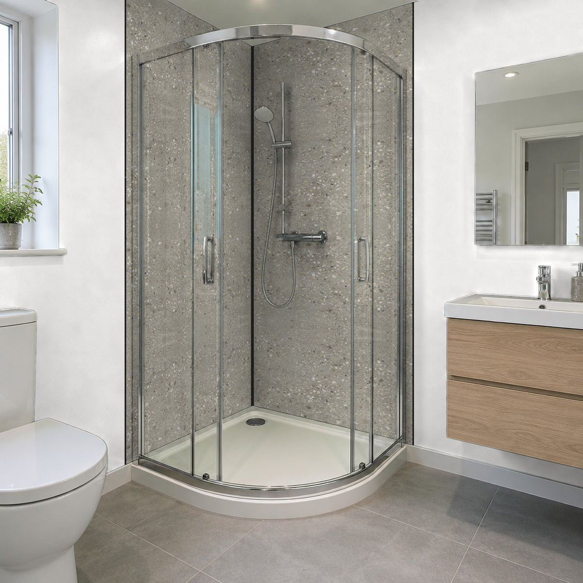 Concrete Rapid Stone panels in a corner quadrant shower, panels finished with corner and end trims